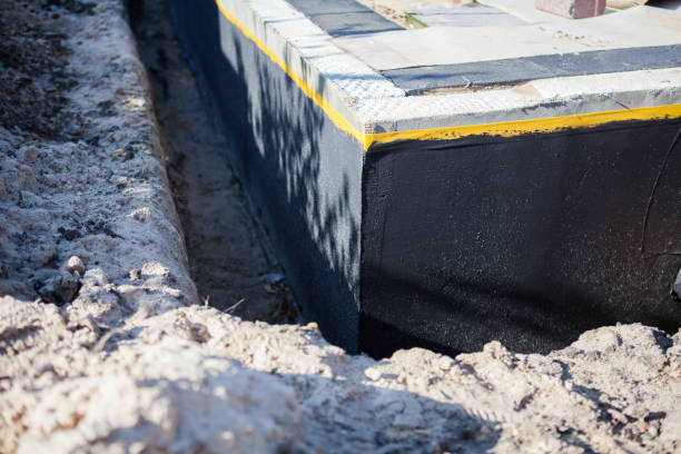 Professional Basement Waterproofing technician working in Maywood, IL
